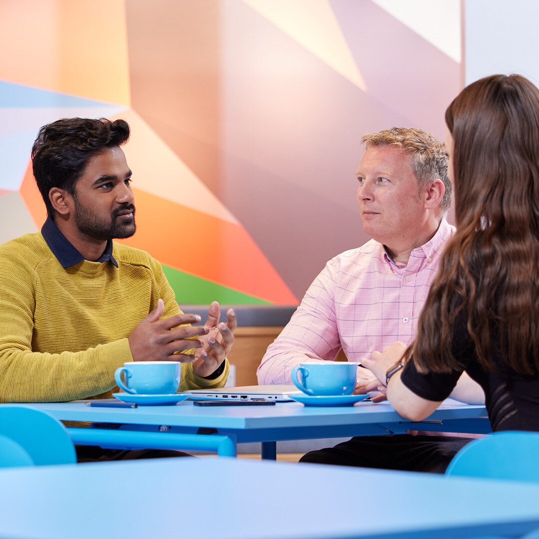 Three colleagues in a meeting