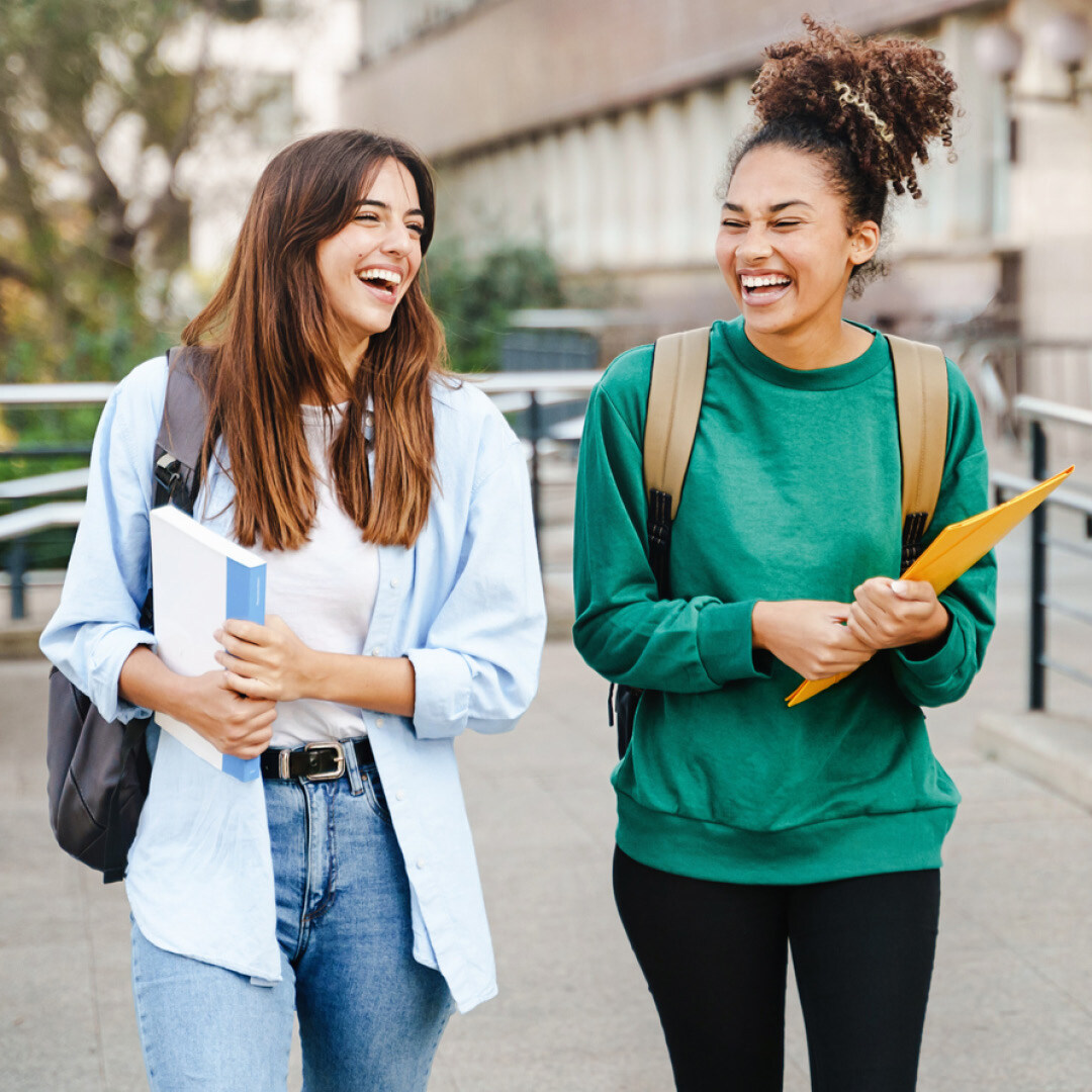 Two female students laughing